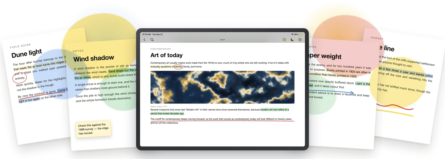 ASAPDF on iPad with highlights, circled words and pen marks on a page, fanned between other marked-up pages.